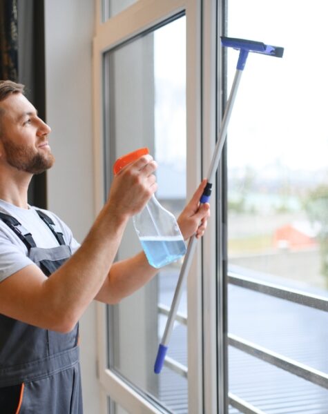 Male,Professional,Cleaning,Service,Worker,In,Overalls,Cleans,The,Windows Male,Professional,Cleaning,Service,Worker,In,Overalls,Cleans,The,Windows